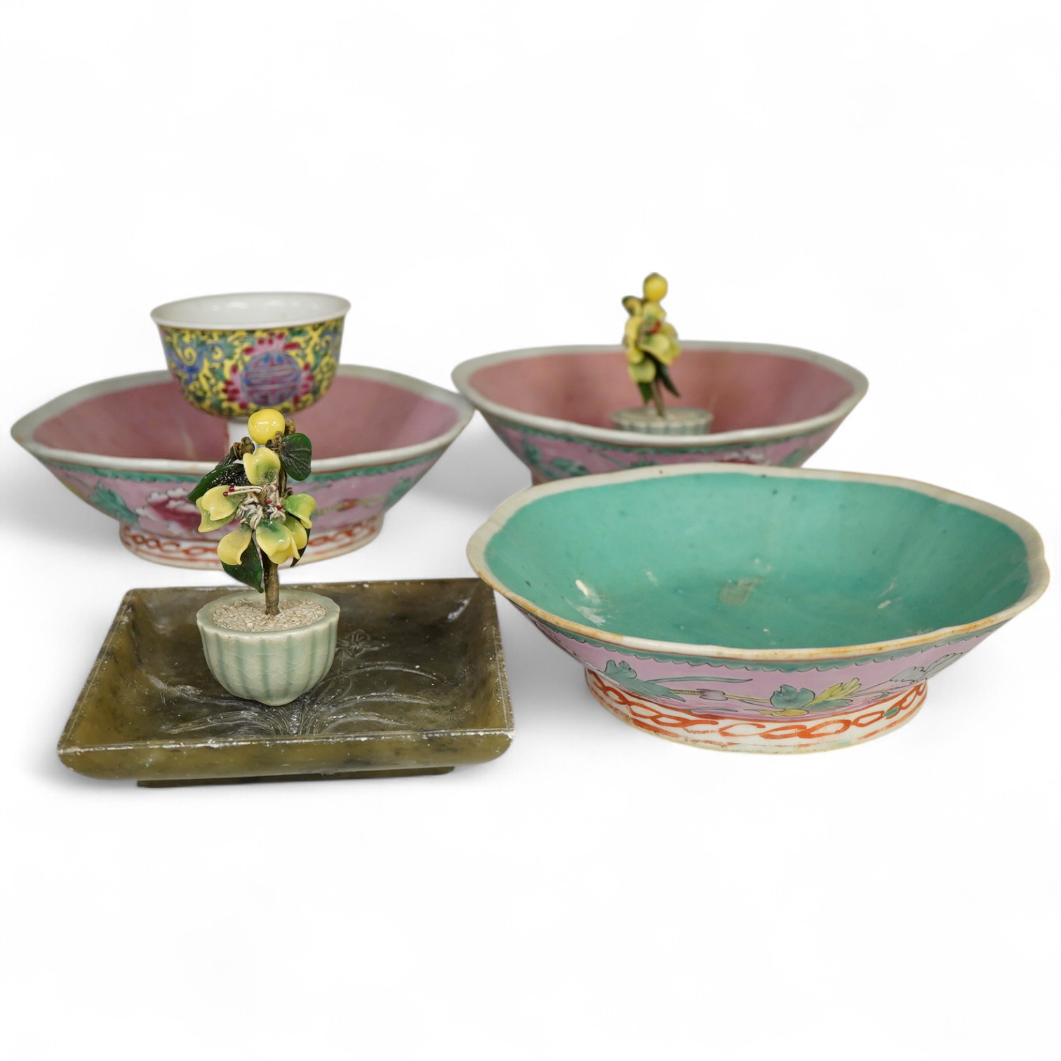 Three Chinese dishes, a famille rose stem cup, two hardstone threes and a soapstone dish